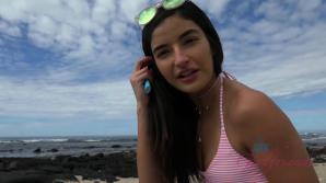 Emily has fun flashing you at the beach.